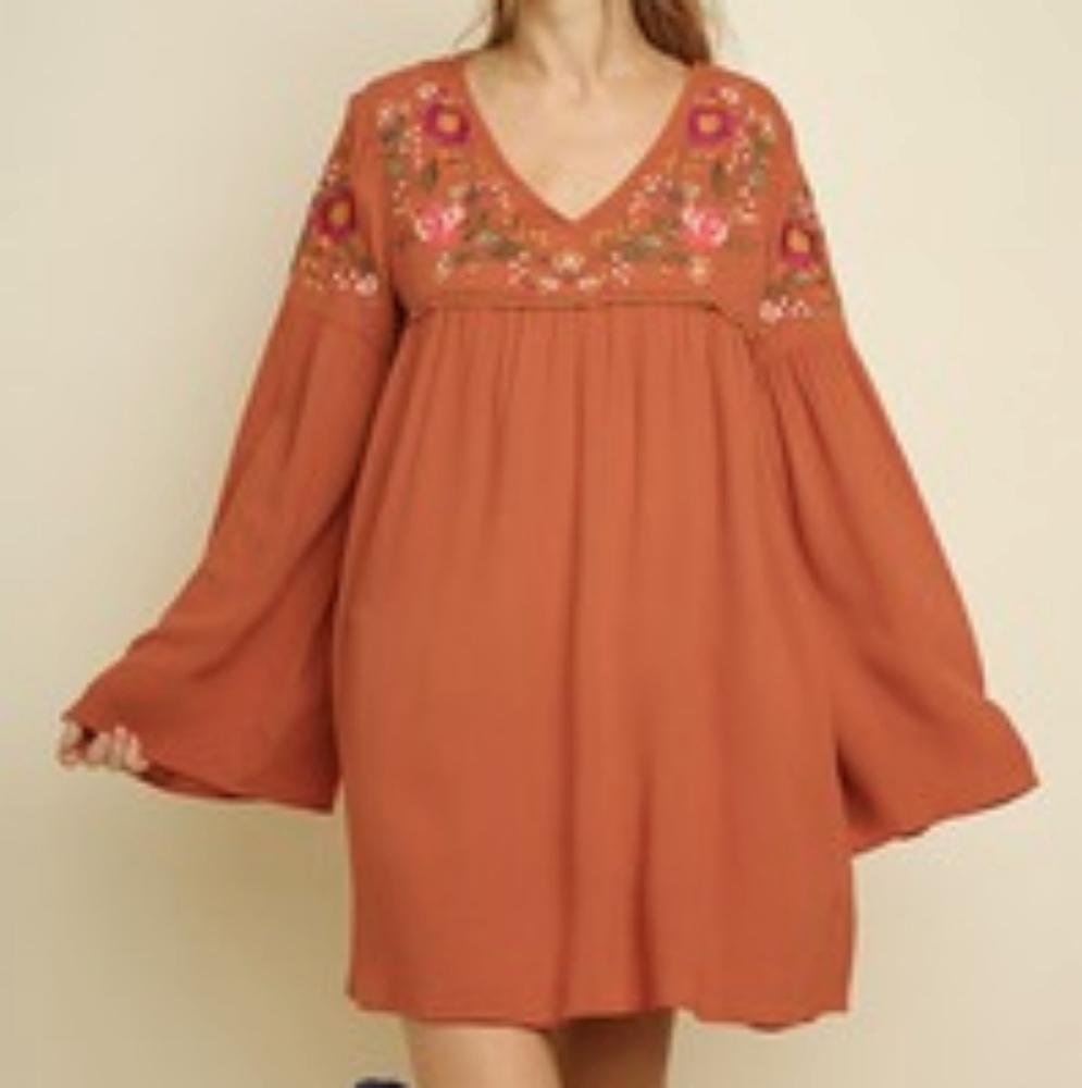 Long sleeve shirt with bell sleeves